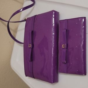 Kate Spade, crossbows & matching wallet.